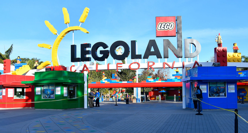 Front entrance of Legoland California with Legoland Sign and entry gates