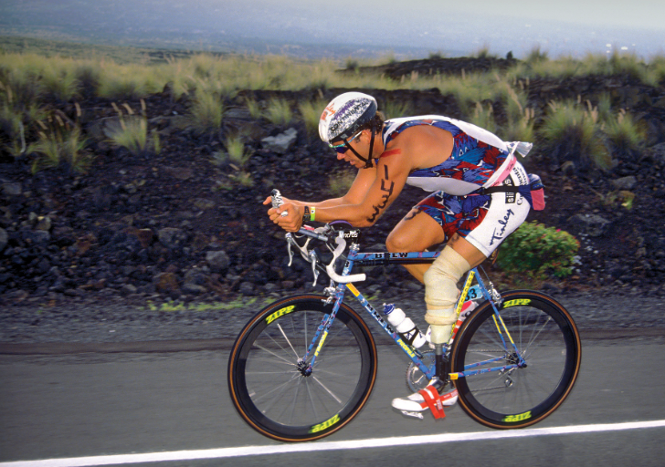 Jim MacLaren competing on a road bike with his prosthetic leg during a race